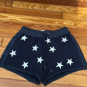 Navy blue sweat-shorts with white stars